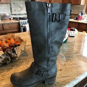 Pair of faux leather knee high boots